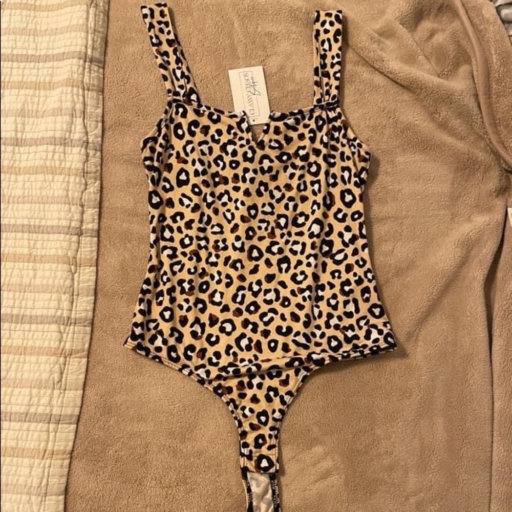NWT cheetah print bodysuit
